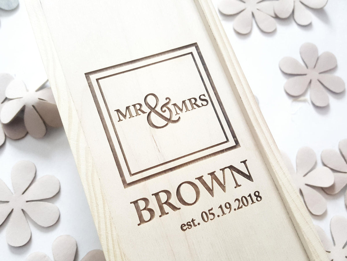 Close-up of Mr and Mrs engraving design #2 on a solid wine box lid