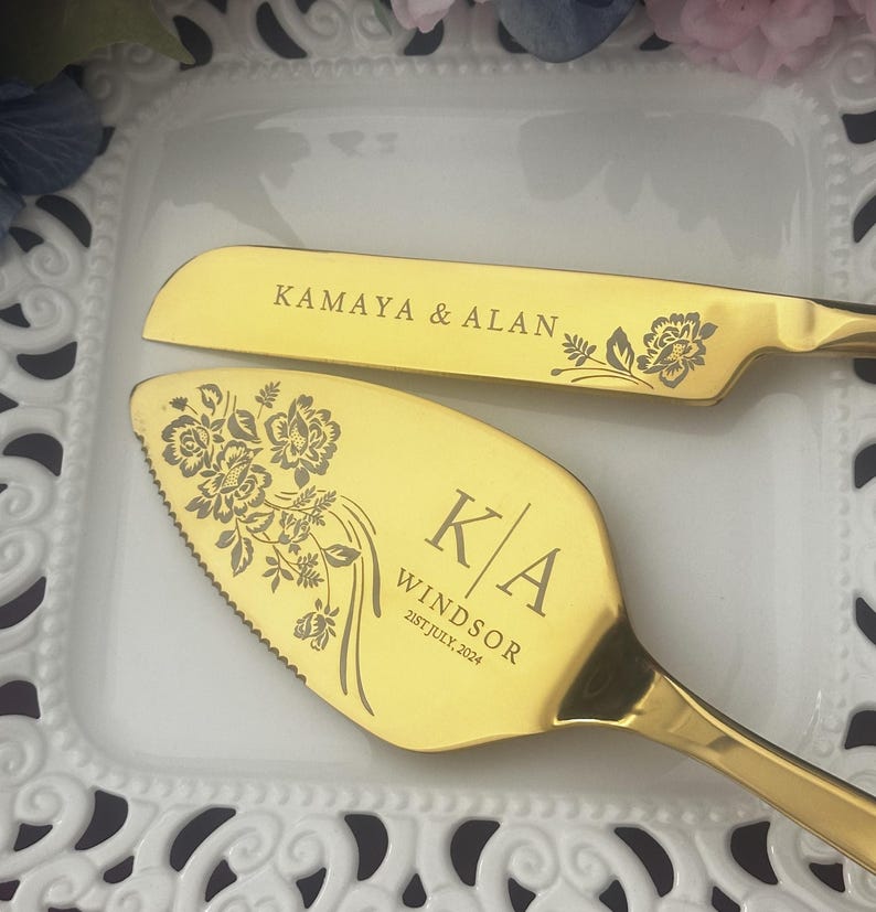 Vintage floral engraving on a personalized wedding cake knife and server
