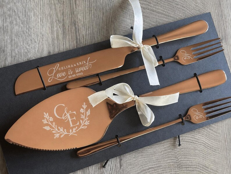 Rose gold wedding cake knife and server with floral monogram engraving