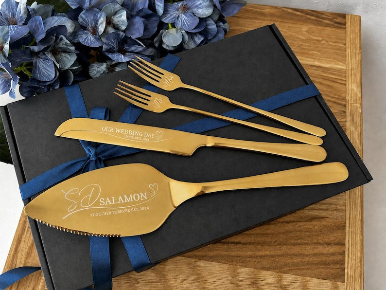Gold wedding cake knife, server and forks with personalized monogram