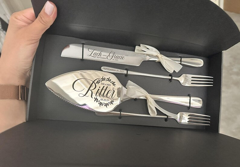 Silver wedding cake knife and server in a black gift box