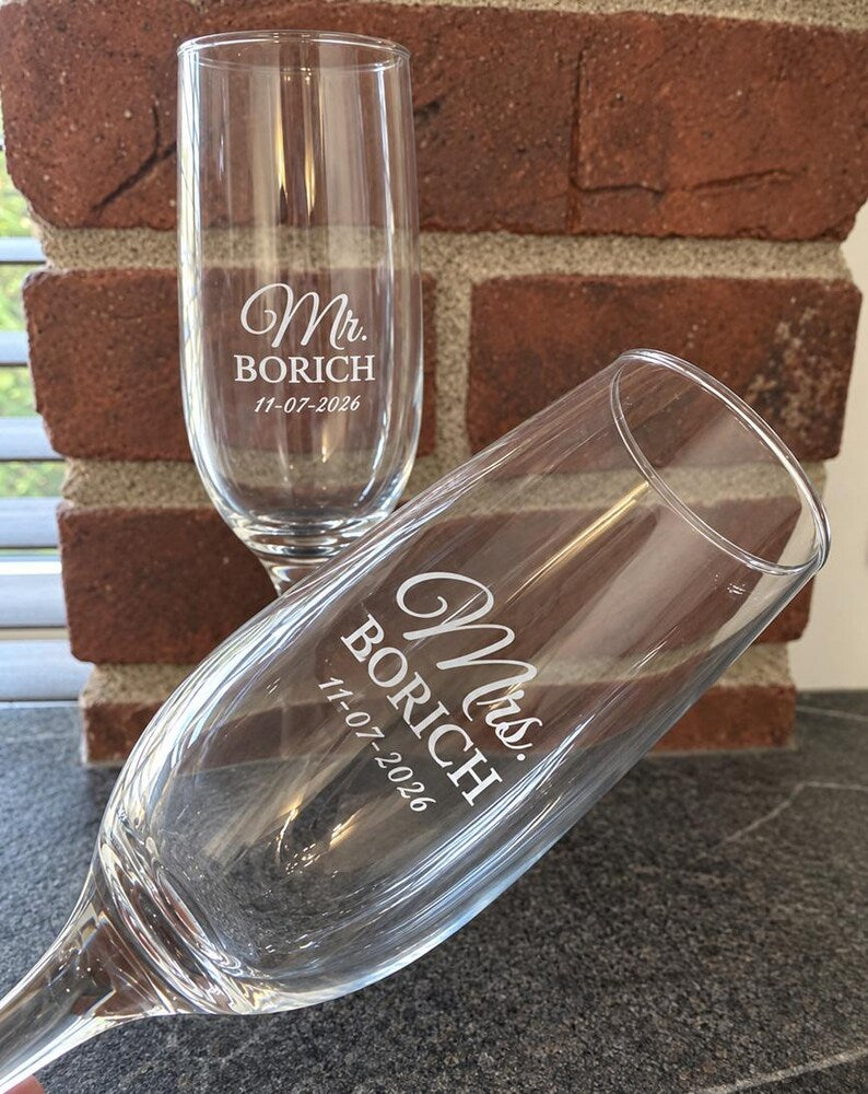 Mr and Mrs engraved champagne flute pair with surname and wedding date