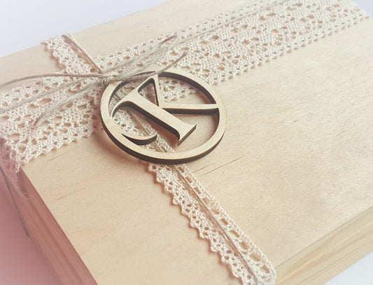 2 custom sets of personalized letter tags. 5 wooden initial tags 2.3" size. 5 tags 3.5" size. Letters - J K L N V