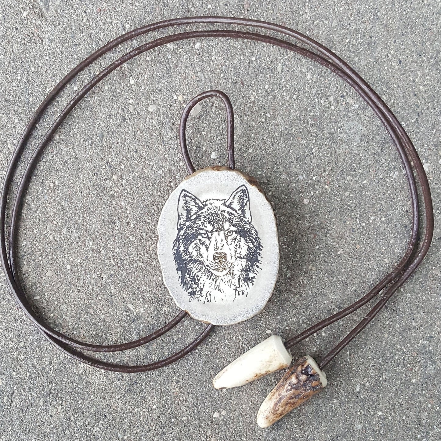 Engraved Wolf Bolo Tie: Deer Horn Pendant, Leather Strap Necklace